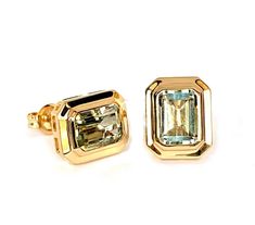 emerald cut green amethyst stud earrings in 14k gold bezel set f matching pendant MP3478GAM AND RING MR5065GAM ring MR4988 v other color stones available, please inquire matching necStone Information: 2 7 X 5 mm emerald cut green amethyst 2.00 cts ll Gold: White, yellow and rose gold d in stock: one available in 14k yellow gold Green Amethyst Earrings, Amethyst Set, Amethyst Studs, 14k Yellow Gold Necklace, Color Stones, Blue Topaz Earrings, Topaz Earrings, Lemon Quartz, Color Stone