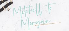 the words mitchell to morgan are written in green and gold on a white marble background