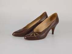 Step into timeless elegance with our Vintage All Leather Pumps in Choco Brown, a symbol of refined sophistication and impeccable craftsmanship. Crafted with care and attention to detail, these pointy toe kitten heel shoes boast a luxurious all-leather construction, ensuring both style and durability. The rich choco brown hue adds a touch of warmth and versatility to any ensemble, while the patchwork design adds a unique and eye-catching element. Elevate your look with these vintage pumps, perfec Elegant Brown Closed Toe Court Shoes, Brown High Heel Court Shoes For Formal Occasions, Elegant Brown Court Shoes With Low Heel, Elegant Brown Court Shoes With Leather Sole, Brown Almond Toe Court Shoes For Formal Occasions, Classic Closed Toe Court Shoes For Formal Occasions, Classic Fitted Brown Court Shoes, Luxury Brown Court Shoes With Pointed Toe, Elegant Brown Low Heel Court Shoes