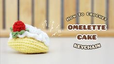 there is a crochet cake with a cherry on top and the words how to crochet omelette cake