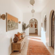 the hallway is clean and ready for guests to use it as an entrance way or sitting area