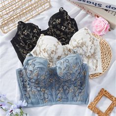 Embrace elegance and comfort with our exquisite collection of embroidered lace bralettes, designed to offer both style and support without sacrificing one for the other. Each piece in this collection is beautifully embellished with delicate floral lace, intricate embroidery, and comes in three timeless colors: classic black, pristine white, and a serene shade of blue, making them perfect for a var.. Flower Corset, Embroidered Bra, Knee High Boots Flat, Short Tank Top, Boned Corsets, Solid Leggings, Lace Flower, Intricate Embroidery, Lace Flowers