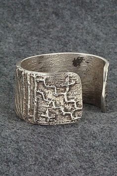 Tufa Cast Sterling Silver Bracelet Navajo - Etsy Modernist Sterling Silver Engraved Jewelry, Modernist Engraved Sterling Silver Jewelry, Artisan Sterling Silver Bracelet With Etched Details, Hand Cast Sterling Silver Wide Band Jewelry, Artisan Engraved Sterling Silver Bracelet, Silver Bohemian Hand-cast Bracelets, Bohemian Silver Hand-cast Bracelets, Bohemian Silver Hand Cast Bracelets, Engraved Sterling Silver Brutalist Jewelry