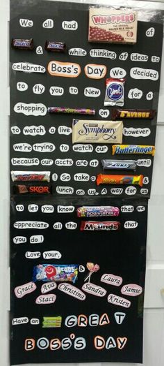 a bulletin board with candy bar stickers attached to it's back wall in front of a door