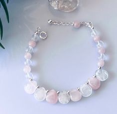 Unique Find ! Rose Quartz and Clear Quartz Bracelet in 925 Sterling Silver . Smooth 8 Briolette Stones . Subtle Pink and Clear alternate Stones  Complements most outfits . Simple and Elegant / Stylish looking  Briolette Size : 10 mm x 10 mm approx Round stones : 6 mm  Length : 7 inches + 1.50 inches Sterling Silver Spring Clasp Stone for LOVE : Rose Quartz  Stone for LUCK : Clear Quartz Silver Rose Quartz Bracelets As Gift, Silver Rose Quartz Bracelets For Gifts, Silver Rose Quartz Bracelet For Gift, Silver Rose Quartz Round Bracelets, Pink Sterling Silver Crystal Bracelet As A Gift, Rose Quartz Stone, Fish Hook Earrings, Silver Spring, Quartz Bracelet