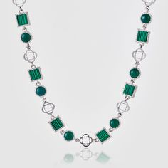 Length: 19.5"Stone Size: 5-10mm Renowned for its abundance of positive energy, the Quartz Gemstone Necklace is handcrafted with premium-cut Quartz and Malachite gems. Linked by Silver Clovers throughout, each stone is housed within a bezel setting, boasting full beveled edges that not only enrich their vibrant green hues but also enhance their durability. Unique coupled links ensure a perfect fit along the neckline, while our classic CD clasp and scratch-proof plating present the quality of a pi Luxury Silver Necklaces With May Birthstone, Luxury Silver Necklaces For May Birthstone, Luxury Silver Necklace For May Birthstone, Ice Necklace, Pearl Shop, Green Hues, Green Quartz, Pearl Gemstone, Vibrant Green