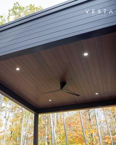 a ceiling fan on the outside of a house