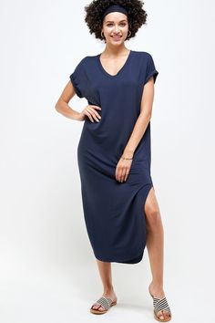 Long solid basic dress features side slits. short sleeves with rolled sleeves. v-neck. Solid V-neck Plain Midi Dress, Solid Color V-neck Midi Dress, Casual Midi Dress With Side Slits And Short Sleeves, Casual Short Sleeve Midi Dress With Side Slits, Solid Color V-neck Short Sleeve Summer Dress, Plain V-neck Midi Dress For Summer, Plain V-neck Summer Midi Dress, Solid Color V-neck Short Sleeve Dress For Spring, Solid Maxi Dress With Side Slits And Split Hem