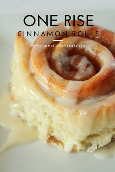 a close up of a cinnamon roll on a plate with the words, one rise cinnamon rolls