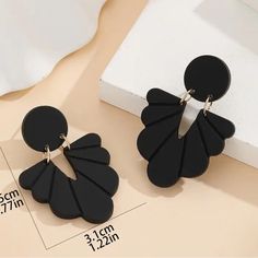 These Elegant Black Earrings Feature A Beautiful Carved Pattern That Adds A Touch Of Sophistication To Any Outfit. The Dangle/Drop Style Is Perfect For Adding A Pop Of Style To Your Jewelry Collection, And The Black Color Complements Any Outfit. Ideal For Any Occasion, These Earrings Are A Must-Have For Any Fashion-Forward Individual. Perfect For Those Who Love To Make A Statement With Their Accessories, These Earrings Are Sure To Impress. Pottery Texture, Earrings Acrylic, Summer Earrings, Color Complement, Acrylic Designs, Summer Earring, Black Acrylic, Black Acrylics, Black Earrings