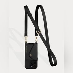 a camera strap attached to a cell phone case with a lanyard on the side