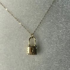 Lock In A Fabulous Look With This Padlock Pendant Necklace. -14k Yellow Gold -16.5"+2" -Made In Italy 14k Gold Necklace With Gold Clasp, 14k Gold Necklace With Gold Clasp For Gift, Classic Jewelry With Gold Clasp For Gift, 14k Gold Jewelry With Gold Clasp For Anniversary, 14k Gold Jewelry With Gold Clasp For Gift, Classic Necklace With Gold Clasp For Gift, Classic Gold Clasp Necklace For Gift, Classic Necklaces With Gold Clasp For Gifts, Formal Gold Jewelry With Lock