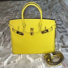 Practically Brand New, Only Worn One Time. Strap Has Not Even Been Opened Or Used. Dimensions Are 11 Inches Width And 9 Inches Length. Not A Designer Bag But Is Real Leather. Luxury Yellow Rectangular Shoulder Bag, Luxury Yellow Shopping Bag, Yellow Rectangular Bag With Branded Hardware, Yellow Rectangular Bags With Branded Hardware, Yellow Travel Bag With Branded Hardware, Luxury Yellow Tote Bag, Yellow Leather Shoulder Bag With Branded Hardware, Luxury Yellow Satchel Shoulder Bag, Luxury Yellow Shoulder Bag For Shopping