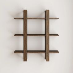 a wooden shelf with four shelves on each side and one in the middle, against a white wall