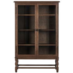 a wooden bookcase with glass doors on the front and bottom shelves, against a white background