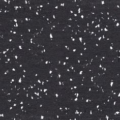 black and white speckled background with lots of small dots in the center, including one large