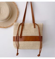 In Stock Fast Shipping! Medium sized straw woven tote bag with leather trims perfect for all occasions. PU leather strap Drawstring closure Inside pocket Size approximately 13.7"W X 10.2"H X 4.5"D 11.8'' handle drop Designer Style ID: 8351 Straw Woven Tote Bag with Leather Straps, Summer Bag, Everyday Shoulder Bag, Beach Bag Vacation Crochet Leather Bag With Woven Detail, Beige Leather Straw Bag With Woven Detail, Woven Leather Shoulder Bag For Vacation, Beige Woven Leather Crochet Bag For Everyday Use, Leather Shoulder Bag With Woven Detail For Vacation, Beige Leather Straw Bag For Travel, Leather Woven Shoulder Bag For Vacation, Beige Woven Leather Crochet Bag, Beige Braided Tote Shoulder Bag