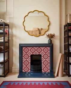 a living room with a fire place and rug