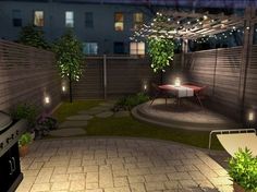 an outdoor patio is lit up at night