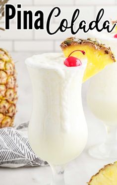 two glasses filled with pineapple and whipped cream