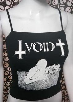 This is a black Void crop tank top with spaghetti straps. This has a Void image screen printed on the front. 56% cotton/ 38% polyester/ 5% SpandexThese are handmade screenprinted and slightly vary from the photo. Please feel free to email me any questions. Thanks for looking.Due to an influx of incorrect addresses if a package is returned,  you must pay the shipping cost to resend the item to you.I do not do exchanges and I do not take returns unless the item is damaged. I thoroughly check each Alternative Style Cotton Tank Top For Concerts, Summer Emo Style Cotton Tops, Alternative Cotton Tank Top For Concerts, Edgy Cotton Crop Top For Alternative Fashion, Summer Cotton Emo Style Tops, Fitted Alternative Style Tank Top For Summer, Cotton Crop Top For Concert, Punk Style Cotton Crop Top For Concerts, Summer Emo Cotton Tops