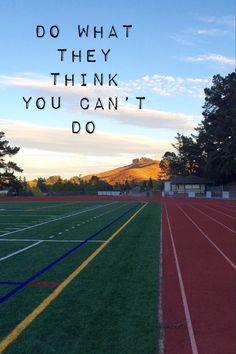 the words do what they think you can't do are in front of a running track