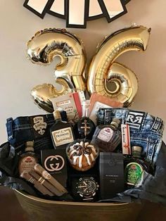 a large basket filled with lots of different items next to a clock on the wall