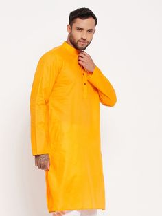 VM BY VASTRAMAY Men's Orange Cotton Kurta Discover the elegance of traditional wear with the VM BY VASTRAMAY Men's Orange Cotton Kurta. Perfect for festive occasions and cultural celebrations, this kurta combines style and comfort effortlessly. Embrace the vibrant orange hue and soft cotton fabric to make a statement wherever you go. Features Vibrant orange color Comfortable cotton fabric Full sleeves Traditional design with a modern touch Perfect for festive occasions Specifications Brand: VM B Classic Long Sleeve Festive Traditional Wear, Traditional Long Sleeve Sherwani For Puja, Classic Traditional Wear For Eid Festive, Dabka Embellished Traditional Wear For Festivals, Ceremonial Cotton Kurta For Festivals, Cotton Kurta For Ceremonial Festivals, Ceremonial Cotton Straight Kurta, Traditional Solid Cotton Kurta, Traditional Long Sleeve Kurta For Puja