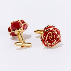 "Say \"I love you,\" with our Burgundy Bliss Eternal Cufflinks. Delicately framed in gold, this perfectly preserved pair of wearable real roses symbolize everlasting love, passion, and desire. Timeless and vibrant, red roses are the right choice for every occasion. The object of your affection will enjoy wearing your stylish and meaningful gift and think of your sweet sentiments forever. Revealed in the rich details of each pair of Eternal Cufflinks is the expert craftsmanship of our skilled art Elegant Red Cufflinks For Formal Occasions, Rose Classic Formal Jewelry, Classic Rose-colored Formal Jewelry, Rose Gold Jewelry For Formal Occasions And Gifts, Rose Gold Jewelry With Roses For Formal Occasions, Elegant Formal Jewelry With Rose Details, Elegant Formal Jewelry With Roses, Classic Rose Design Jewelry For Gifts, Luxury Rose Design Jewelry As A Gift