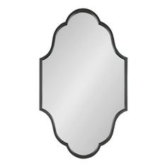 a black and white mirror with an ornate frame on the front, against a white background