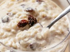 a bowl filled with oatmeal and raisins