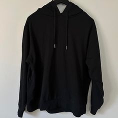 Brand New Black Oversized Hoodie Athleisure Style, Black Oversized Hoodie In Athleisure Style, Basic Black Hoodie Sweatshirt, Black Long Sleeve Basic Hoodie, Basic Black Long Sleeve Hoodie, Black Stretch Sweatshirt For Winter, Black Stretch Winter Sweatshirt, Black Basic Hoodie With Relaxed Fit, Basic Black Sweatshirt For Streetwear