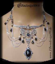 A very elegant choker in gothic style, which, like all my jewelry, was made with great care and attention to detail. The necklace was made from silver-plated metal ornaments with black faceted glass beads and black glass stones. Black diamond rhinestones were also used. The chain is adjustable from approx. 39 cm-46 cm, with a black drop hanging on the extension chain. Silver Vampire Style Necklace, Gothic Choker Necklace For Jewelry Making, Silver Halloween Festival Choker, Silver Choker For Halloween Festival, Halloween Festival Silver Choker, Silver Vampire Style Choker As Gift, Witchy Silver Jewelry For Parties, Fantasy Halloween Choker Necklace, Elegant Halloween Festival Necklaces