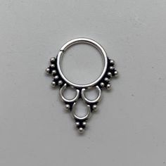 These are so pretty and light. Made is 925 sterling silver with tribal details. The rings are all 10mm (1cm or .40”) in diameter. The wire is 18 gauge.They are only finished on one side since each one is made BY HAND so there may be very slight differences.One of the images contains numbers to specify which you would like from the drop down menu. Sterling Silver Septum Ring, Nickel-free Sterling Silver Septum Ring, Adjustable Silver Toe Ring Body Jewelry, Silver Hoop Septum Ring Stackable, Nickel-free Silver Bohemian Septum Ring, Bohemian Silver Nickel-free Septum Ring, Bohemian Sterling Silver Septum Ring As Gift, Bohemian Nickel-free Silver Septum Ring, Bohemian Nickel-free Round Septum Ring