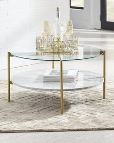 Wynora Coffee Table T192-8 Stationary Occasionals By ashley - sofafair.com Marble Shelf, Round Cocktail Tables, Gold Coffee Table, Marble And Gold, Glass Top Coffee Table, Ashley Furniture Homestore, Coffee Table White, Marble Coffee Table, Faux Marble