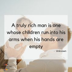 a man holding a baby in his arms with the caption truly rich man is one whose children run into his arms when his hands are empty