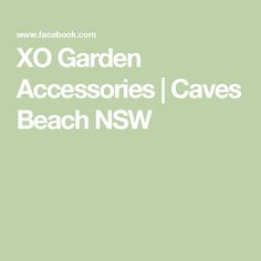 the words xo garden accessories / caves beach nsw on a light green background