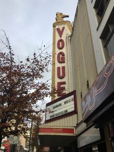 a theater sign on the side of a building