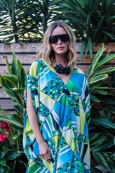 This Pucci inspired print is the perfect add on to a glam dinner or cover up by the pool. This exquisite garment is more than just a piece of clothing; it's a celebration of fabric in all its glory. Crafted with generous amounts of rayon and lots of love, this piece offers an airy fit designed to drape beautifully on all body types. Bohemian splendor, handmade in California. Our caftans are a voluminous one-size fits all garment, approximately 50" in length. The intention of this shape is to cel Multicolor Abstract Print Kaftan For Vacation, Vacation Kaftan With Multicolor Abstract Print, Vacation Multicolor Abstract Print Kaftan, Beach Kaftan With Kimono Sleeves And Abstract Print, Printed V-neck Kaftan For Poolside, Chic V-neck Printed Kaftan, Oversized Printed Kaftan For Beachwear, Brand Magazine, Stocking Fillers For Her