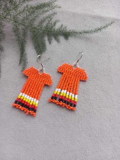 Orange Shirt Day. Beaded Earrings Orange shirt. beaded fringe earrings. Canada - orange shirt - with medicine wheel colours. Orange badge Color: orange.  Measurements: Length - 2.36 inches (6 cm) (including ear wires). Width - 1.18 inches (3,5 cm) Materials: Colour hooks silver Czech beads and strong synthetic thread.  - These earrings would be perfect to wear for orange shirt day (national day for truth and reconciliation) or future Indigenous Peoples Day or Canada Day events. - These earrings are dainty, lightweight, and perfect for everyday or formal wear. - To store these earrings, please lay them flat or to hang. To straighten the fringe, gently roll the beads.   100% handmade. Shipping worldwide Please note that due to lighting effects, monitor's brightness, contrast and other settin Summer Orange Beaded Fringe Earrings, Casual Colorful Beaded Earrings, Truth And Reconciliation, Orange Shirt Day, Indigenous Peoples Day, Beaded Fringe Earrings, Medicine Wheel, Orange Shirt, Canada Day