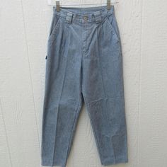 80s high waist pleated tapered jeans. They look like chambray, but are a thick-ish denims. So cute Side pockets plus two back pockets. Wide belt loops. Made in the Philippines for PADDOCK'S JETSETTER. Label size 26, but run a little smaller Please compare measurements to a similar garment that fits you well 24" waist  11-1/2" rise 36" hips 25" inseam  Good vintage condition with minimal signs of use and age. They have been hemmed, but hem is as good as professional Retro Washed Blue Relaxed Fit Bottoms, Retro Relaxed Fit Washed Blue Bottoms, Washed Blue Retro Bottoms With Relaxed Fit, Vintage Denim Blue Pants For Summer, Vintage Washed Blue Bottoms For Spring, Tapered Bottoms With Pockets For Spring, Tapered Dark Wash Bottoms For Spring, Spring Tapered Bottoms With Pockets, Retro Denim Workwear Bottoms