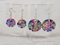 These handmade resin earrings are filled with multicolour sea shell stones. They are light and colourful. There are 2 sizes, 2cms and 3cms. You can also choose between gold and silver earring hooks. They are hypoallergenic and safe for sensitive ears. Colorful Round Earrings Gift, Colorful Round Earrings For Gift, Handmade Rainbow Round Earrings, Handmade Round Rainbow Earrings, Rainbow Colorful Earrings For Gift, Multicolor Resin Round Jewelry, Multicolor Round Resin Jewelry, Hypoallergenic Rainbow Round Earrings, Rainbow Round Earrings