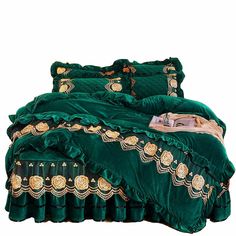 a green comforter set with gold trimmings