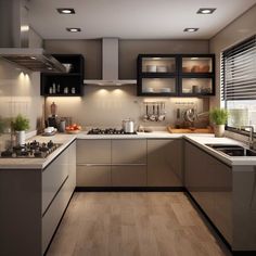 a modern kitchen with stainless steel appliances and wood flooring