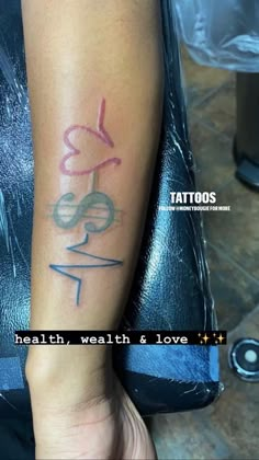 a woman's arm with a tattoo on it that says health watch and love