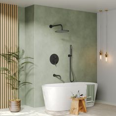 a bath tub sitting next to a green wall in a room with wooden slatted walls