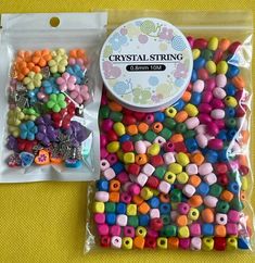 the bag is filled with lots of different colored bead beads in it's package