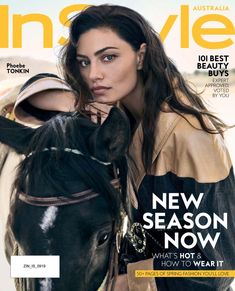 the cover of instyle magazine with a woman holding a horse