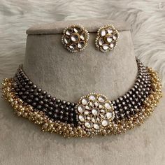 Unique Silver Black Oxidized Base Fusion Necklace with Ahmedabadi high quality Kundan Center Motif in gold finish surrounded by clusters pearls. This necklace choker comes with cute kundan studs with push screw. Drawstring Dori is adjustable. Perfect to go with any ethnic Indian wear. 💥Ready to ship from USA 💥Super Trendy 💥Kundan Earrings - 3/4th inches in diameter. GIFT IDEAS 👉🏻Ideal Gift for Loved ones, Wife, Mother, Sister. Excellent gift for Birthday,Anniversary, Festivals and Celebrati Oxidized Choker, Ethnic Indian Wear, Kundan Studs, Jewelry Victorian, Victorian Necklace, Kundan Necklace, Bollywood Jewelry, Hippie Necklace, Kundan Earrings