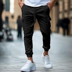 Season:Spring   Fall; Fabric:Cotton Blend; Gender:Men's; Style:Fashion,Streetwear; Elasticity:Micro-elastic; Occasion:Daily,Casual,Outdoor; Fit Type:Regular Fit; Function:Soft,Comfort; Waistline:Mid Waist; Pattern:Plain; Design:Drawstring,Multi Pocket,Elastic Waist; Pants Type:Trousers,Cargo Pants,Jogger Pants; Fly Type:Drawstring,Elasticity; Front page:FF; Listing Date:09/12/2024; Pants Length:Full Length Black Functional Joggers With Pockets, Black Cotton Cargo Joggers, Black Cargo Pocket Joggers For Streetwear, Cheap Cargo Pants, Cheap Men's Cargo Pocket Joggers, Men's Cargo Pants, Pants Jogger, Black Full-length Joggers With Pockets, Black Army